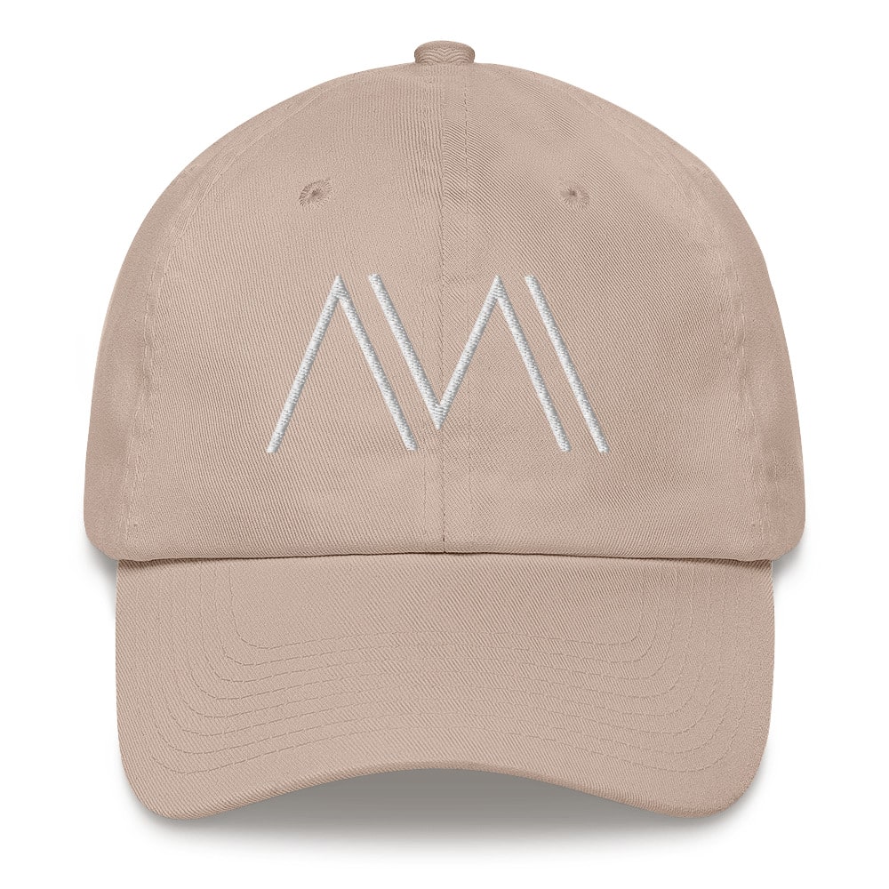 Tan Dad hat with MVMNT Studio logo.