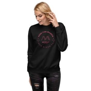 Black crew sweatshirt with coral circle MVMNT Studio design featuring the Here For Women tagline.