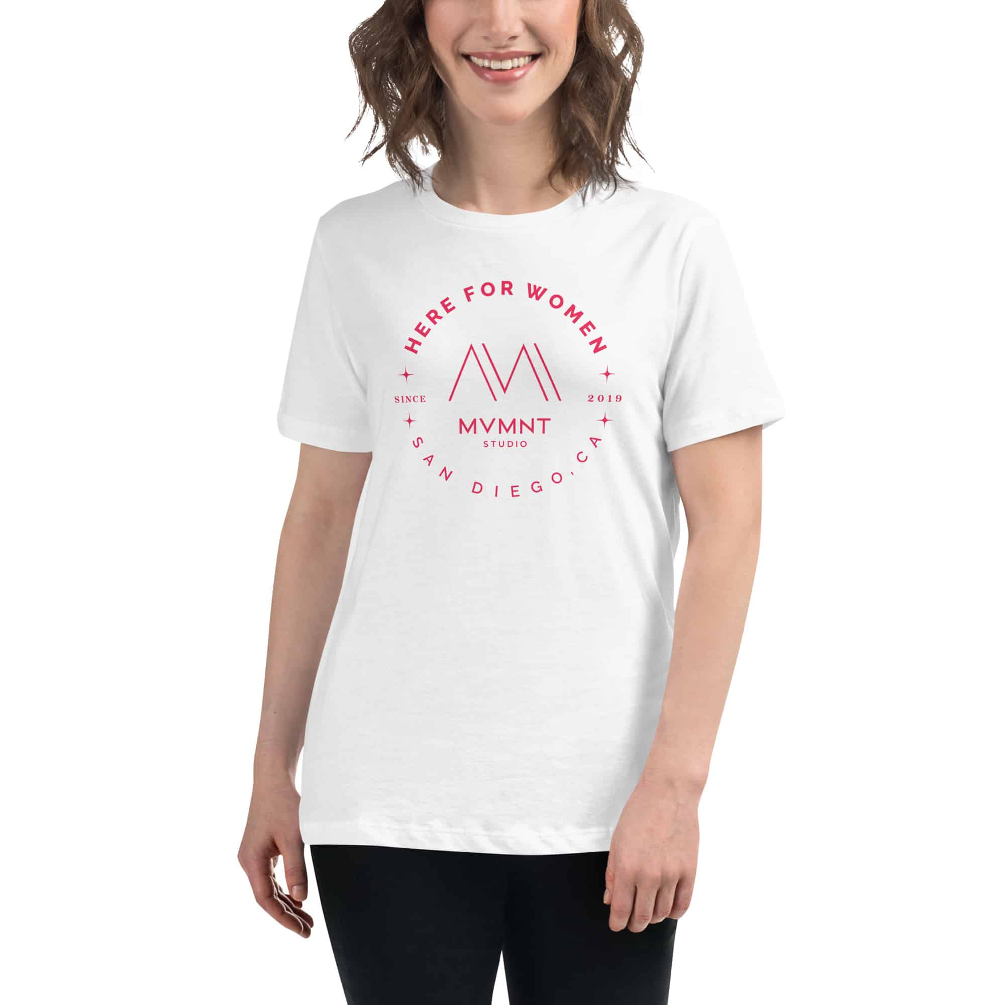 A woman wearing a white t-shirt with the