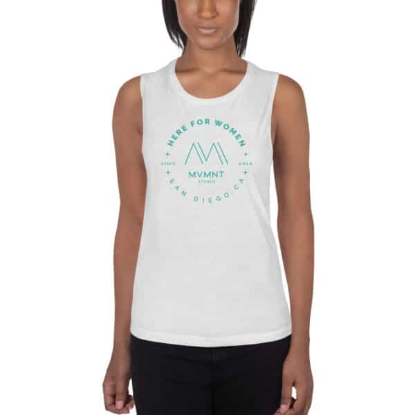 Photo of a black women wearing a white muscle tank top, with the "Here For Women" logo in teal.