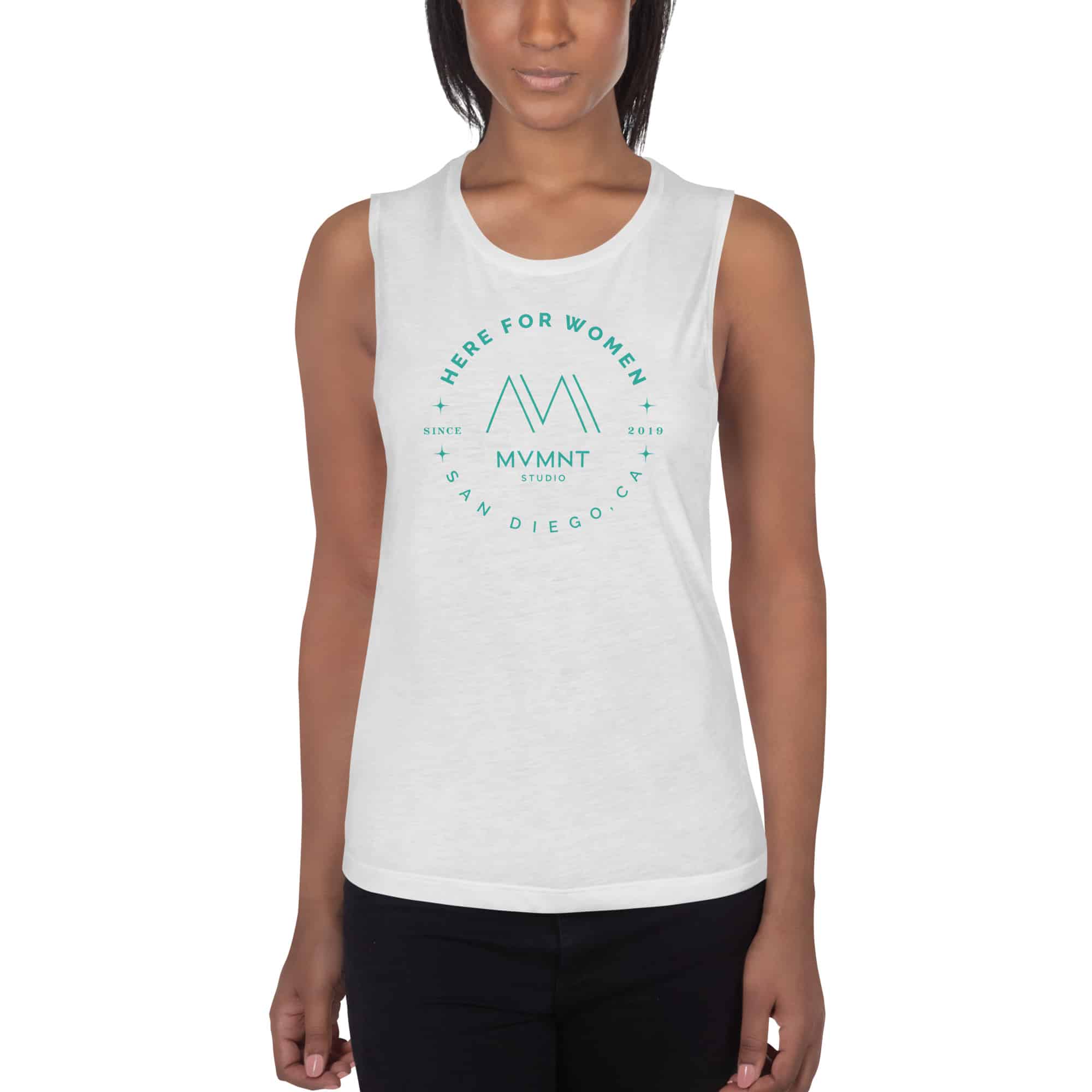 Photo of a black women wearing a white muscle tank top, with the